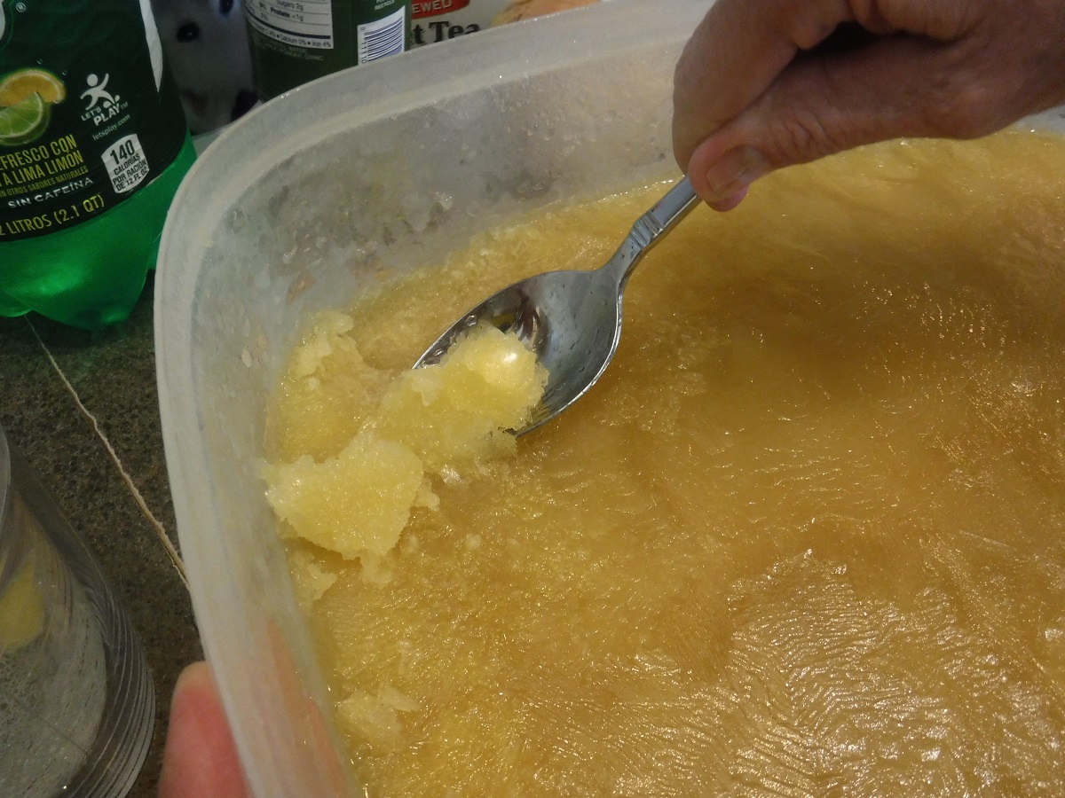 Click to enlarge Scrape the softfrozen slush with a spoon.