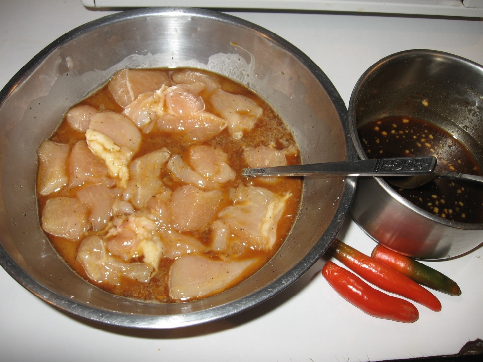 Click to enlarge - Chicken in marinade, sauce made, chilies ready for the wok.