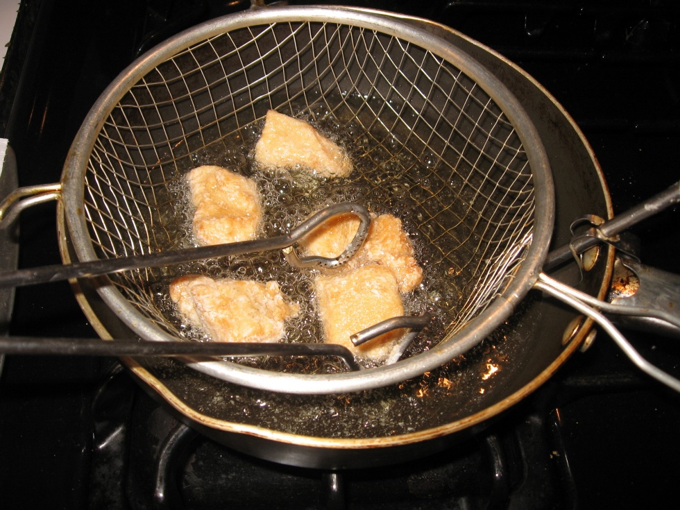 Click to enlarge - Use tongs to turn chicken and brown on all sides, about 5 minutes.