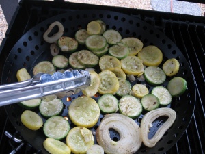 Use tongs to turn the vegetable slices so they brown evenly on all sides.
